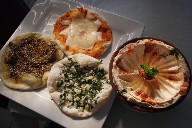 CRANSTON, RI -- 4/11/2017

Food at Mosaic Restaurant includes the Manakish bread (pita with toppings), and the Hummus.



[The Providence Journal/Sandor Bodo]



1012220491 ri_pvd_Food