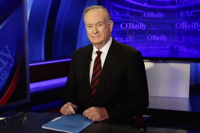 In this Oct. 1, 2015 file photo, host Bill O'Reilly of "The O'Reilly Factor" on the Fox News Channel, poses for photos in the set in New York. O'Reilly was fired Wednesday. THE ASSOCIATED PRESS