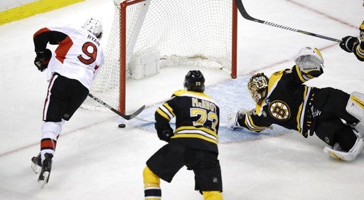Senators right wing Bobby Ryan (9) shoots as Bruins goalie Tuukka Rask tries to make a save on a goal during the third period of Ottawa's 1-0 win in Game 4 of first-round playoff series in Boston on Wednesday night. [AP Photo/Charles Krupa]