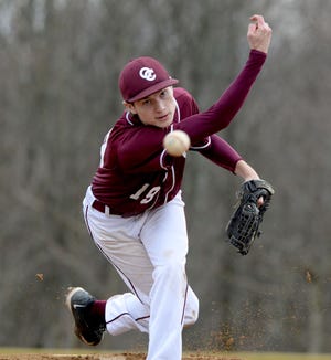 Quigley pitcher Matt Evans fires a pitch during the Spartans' game against  South Side Monday at South Side High School.