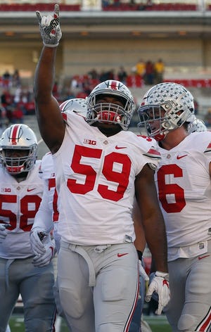 Tyquan Lewis is a key piece on an Ohio State defensive line that is considered one of the best in the nation. [Brooke LaValley/Dispatch]