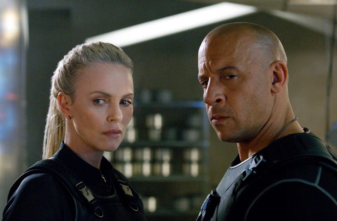 Charlize Theron, left, and Vin Diesel in “The Fate of the Furious.” (Universal Pictures via AP)
