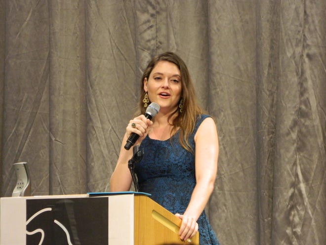 Brooke Axtell, a poet, columnist and survivor of human trafficking and domestic abuse, speaks Thursday, April 20, at the Center for Women in Transition's annual Reach for the Stars Gala. Sarah Heth/Sentinel staff