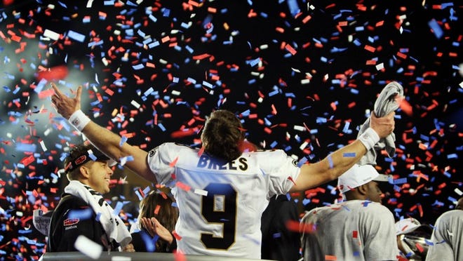New Orleans quarterback Drew Brees celebrates after the Saints beat Indianapolis in Super Bowl XLIV. (Allen Eyestone/The Palm Beach Post)