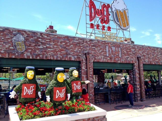 Homer Simpson’s favorite beer, Duff, is available at the “brewery” in the Springfield area of Universal Studios in Orlando. A Florida Senate-backed bill would allow beer companies to sponsor events and participate in other “cooperative” advertising with major Florida theme parks. [MARJIE LAMBERT/MIAMI HERALD FILE PHOTO]