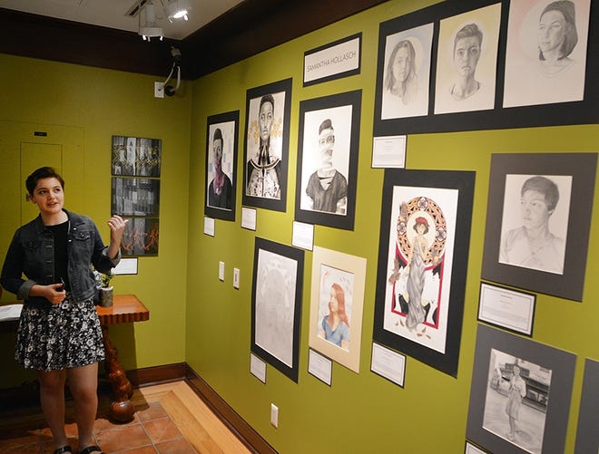 Corning Painted Post IB Art student Samantha Hollasch talks about her portraits on display at the Rockwell Museum. [ERIC WENSEL/THE LEADER]