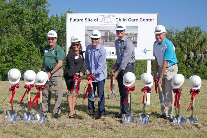 Helping with the ceremonial groundbreaking of the new child-care center at PGT on Friday were, from left: Venice Mayor John Holic, PGT human resources director Debbie LaPinska, PGT CEO Rod Hershberger, PGT president and COO Jeff Jackson and Sky Family YMCA CEO Ken Modzelewski. [HERALD-TRIBUNE STAFF PHOTO / EARLE KIMEL]