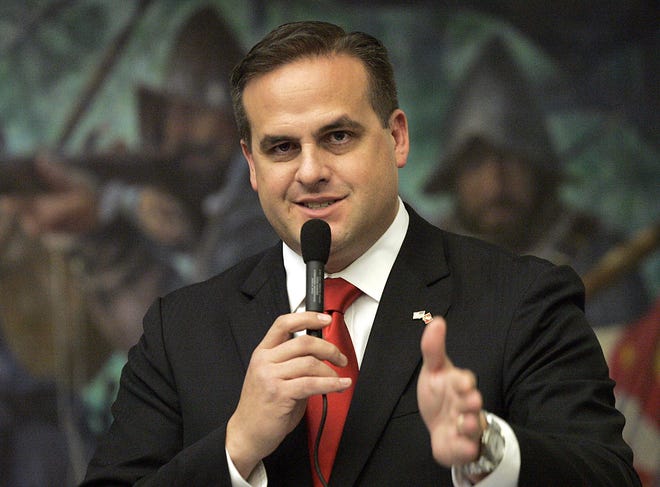Republican state senator Frank Artiles, R-Miami, asking a questions about a pip insurance bill during house session in Tallahassee, March 9, 2012. (AP Photo/Steve Cannon, File)