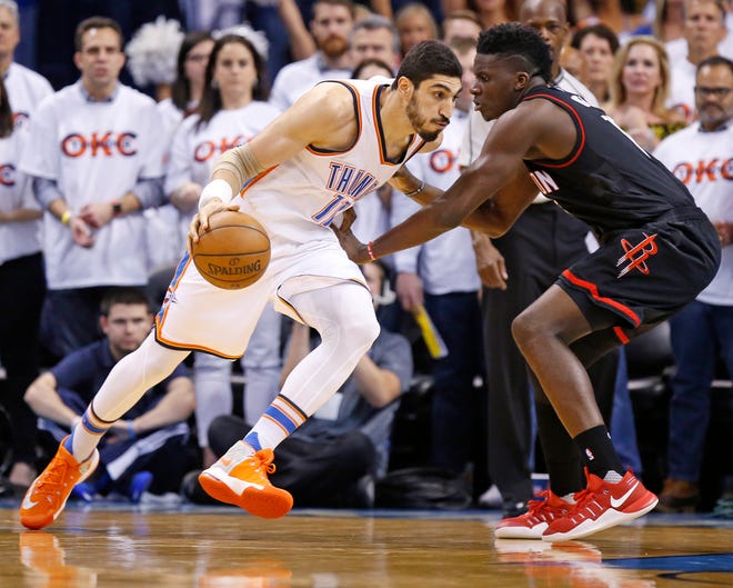 Oklahoma City's Enes Kanter (11) moves to the basket against Houston's Clint Capela (15) during Game 3 in the first round of the NBA basketball playoffs between the Oklahoma City Thunder and the Houston Rockets at Chesapeake Energy Arena in Oklahoma City, Friday, April 21, 2017. Oklahoma City won 115-113. Photo by Nate Billings, The Oklahoman