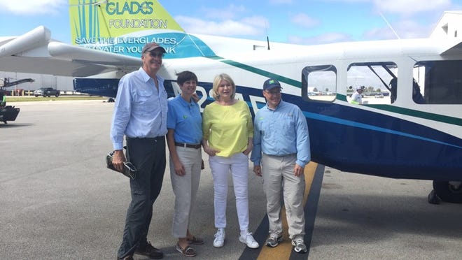 In February, Gary Lickle flew Martha Stewart over the Everglades. Starnding in front of the Airvan they flew are Lickle, left, Deborah Johnson, Martha Stewart and Steven Davis. Courtesy of Gary Lickle