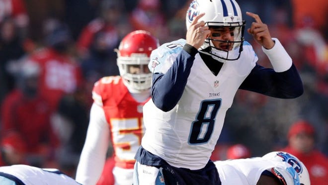KANSAS CITY, MO - DECEMBER 18: Quarterback Marcus Mariota #8 of the Tennessee Titans motions during the game against the Kansas City Chiefs at Arrowhead Stadium on December 18, 2016 in Kansas City, Missouri. (Photo by Jamie Squire/Getty Images)