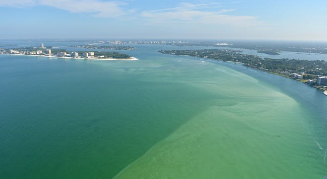 This aerial photo taken in Oct. 2012 shows Big Pass and the large sand shoal at the mouth of the pass. Lido Key is on the left and Siesta Key is on the right. [Herald-Tribune archive / Mike Lang]