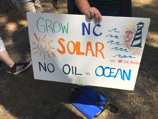Marchers carried signs like this one, made by Kyle Horton, during the Wilmington March for Science. The event was part of a national and international movement advocating for science's inclusion in policy making. ADAM WAGNER/STARNEWS