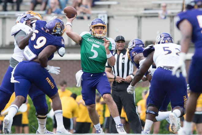 East Carolina quarterback Gardner Minshew throws a pass during the Purple-Gold game at Dowdy-Ficklen Stadium in Greenville on Saturday afternoon. [Todd F. Michalek / Sun Journal Staff]