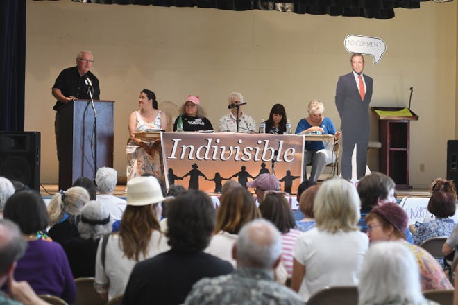 Panel of the Indivisible Victor Valley at the Ca-08 Town Hall for Paul Cook at the Victorville Activities Center on Saturday. 

[David Pardo, Daily Press]
