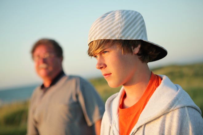 Teen boys have rich emotional lives, and it is up to parents to connect with their sons and keep the communication open. [Bigstock]