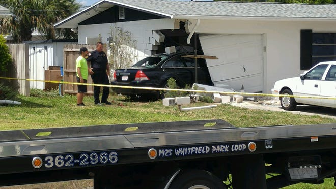 An elderly woman apparently suffering a medical episode crashed into a home in the 3300 block of Southern Parkway West in Bradenton, according to the Bradenton Police Department. [SNN-TV / PJ ROBICHEAU]