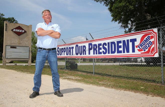 Hugh Sikes, of Sikes Concrete, stands outside the Southport business on Monday. [ANDREW WARDLOW/THE NEWS HERALD]