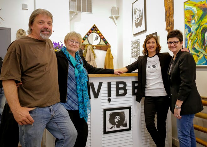 Owners and artists of the of Vibe Art Gallery Scott McKinnon, left, Ruth Bleau, Lisa Wheeler, and Christy Bruna during the official grand opening Saturday at VIBE Art Gallery in Somersworth. [Shawn St. Hilaire/Fosters.com]