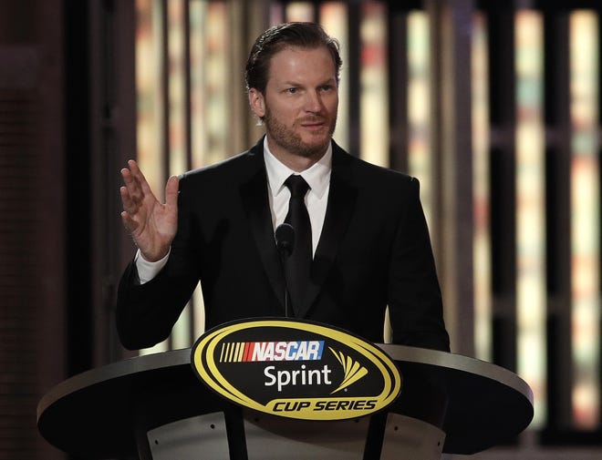 In this Dec. 2, 2016, file photo, Dale Earnhardt Jr. speaks during the NASCAR Sprint Cup Series auto racing awards in Las Vegas. Hendrick Motorsports says Dale Earnhardt Jr. will retire at the end of this season. THE ASSOCIATED PRESS