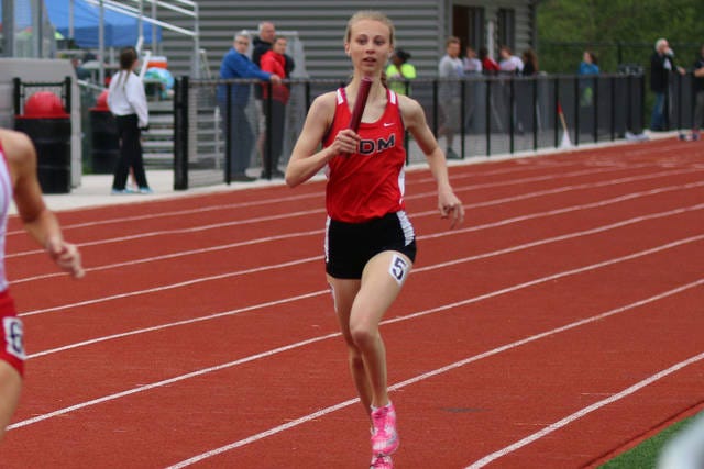 Sadie Juergens ran as the anchor for the Tigers’ first place distance medley team. She also took first in the 800 meter and 3000 meter races. PHOTO BY BAILEY FREESTONE/DALLAS COUNTY NEWS