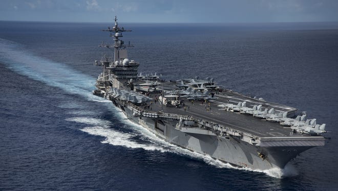 In this April 23, 2017, photo released by the U.S. Navy, the Nimitz-class aircraft carrier USS Carl Vinson transits the Philippine Sea while conducting a bilateral exercise with the Japan Maritime Self-Defense Force. The aircraft carrier will be heading toward the Korean Peninsula for a joint exercise with South Korea. U.S. NAVY/THE ASSOCIATED PRESS