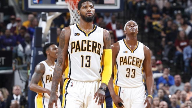 INDIANAPOLIS, IN - APRIL 23: Paul George #13 and Myles Turner #33 of the Indiana Pacers react in the second half of Game Four of the Eastern Conference Quarterfinals during the 2017 NBA Playoffs against the Cleveland Cavaliers at Bankers Life Fieldhouse on April 23, 2017 in Indianapolis, Indiana. The Cavaliers defeated the Pacers 106-102 to sweep the series 4-0. NOTE TO USER: User expressly acknowledges and agrees that, by downloading and or using the photograph, User is consenting to the terms and conditions of the Getty Images License Agreement. (Photo by Joe Robbins/Getty Images)