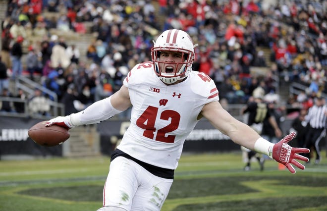 This Nov. 19, 2016, photo shows Wisconsin linebacker T.J. Watt (42) celebrating after returning an interception for a touchdown during the first half of Wisconsin's game against Purdue in West Lafayette, Ind. Watt is projected to be taken in the latter part of the first round or early in the second round of the NFL draft, which begins Thursday, April 27, 2017. [AP FILE PHOTO]