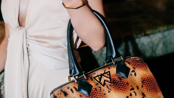 Kelly Wynne handbags allows you to drop off a used handbag for the Grateful Thread and get a discount on a new one. Credit: Kristen Kilpatrick