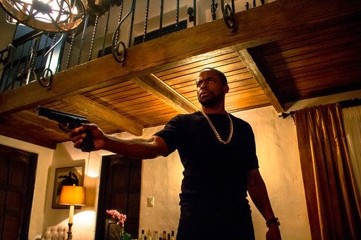 This image released by WWE Studios shows Dule Hill in a scene from, "Sleight." (WWE Studios via AP)