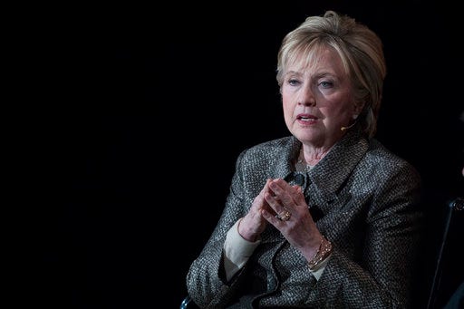 In this photo taken April 6, 2017, former Secretary of State Hillary Clinton speaks in New York. A congressional committee on Thursday, April 27, 2017, asked the Justice Department to consider criminally prosecuting a technology services company that was involved in maintaining a private email server for Hillary Clinton. (AP Photo/Mary Altaffer)