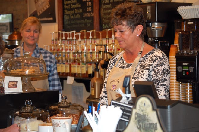 As new owner of Jilly Beans, Mary-Ellen Sattler works alongside former owner Jill Nichols for a smooth transition of ownership. [NANCY HASTINGS PHOTO]