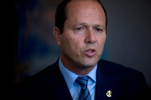 In this Tuesday, April 25, 2017 photo, Jerusalem Mayor, Nir Barkat speaks during an interview with the Associated Press at his office in Jerusalem. Fifty years after Israel conquered east Jerusalem, Barkat said that the anniversary is a time to celebrate, despite the deep rifts and occasional bursts of violence that disrupt daily life in the volatile city. But like other prominent politicians of the hard-line Likud party, Barkat said Jerusalem must remain united under Israeli control, rejects Arab claims that they are second-class residents and insists the city's diverse array of residents are 
“all my children." (AP Photo/Sebastian Scheiner)