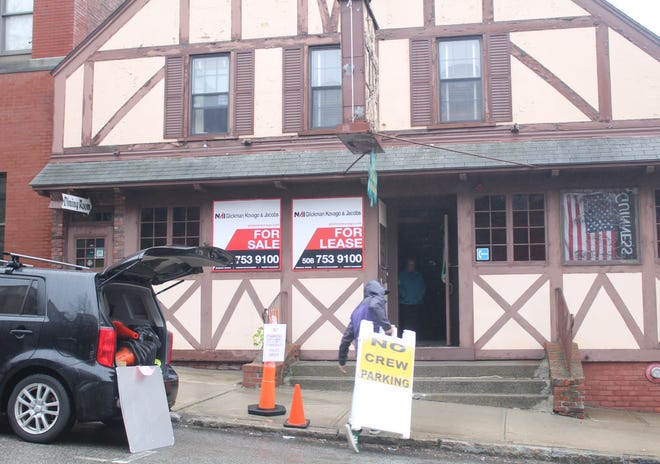 A worker loads signs into the Old Timer on Wednesday. Filming is expected next week inside the closed Clinton restaurant for 'Daddy's Home 2.' [Item photo/JAN GOTTESMAN]