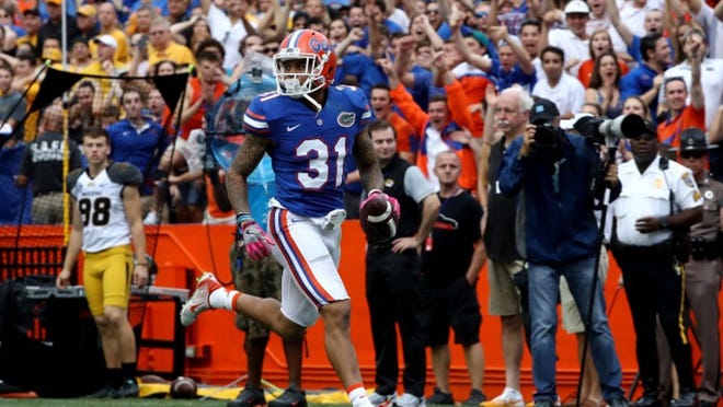 GAINESVILLE, FL - OCTOBER 15: Teez Tabor #31 of the Florida Gators rushes for a touchdown after making an interception during the game against the Missouri Tigers at Ben Hill Griffin Stadium on October 15, 2016 in Gainesville, Florida. (Photo by Sam Greenwood/Getty Images)