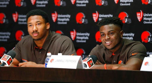 Cleveland Browns' Jabrill Peppers, right, and Myles Garrett answer questions during a news conference at the NFL team's training facility, Friday, April 28, 2017, in Berea, Ohio. (AP Photo/Ron Schwane)