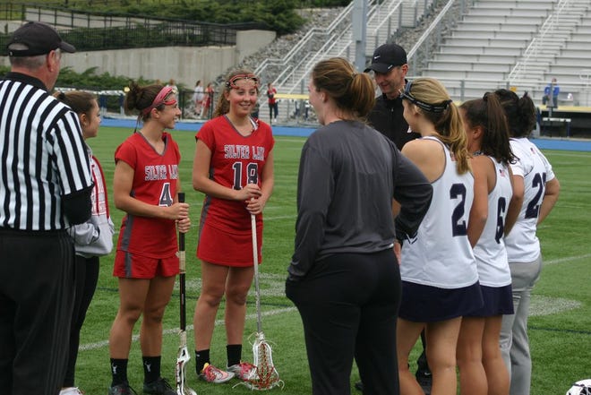 Silver Lake girls lacrosse tracvels across the town to take on Sacred Heart this afternoon.