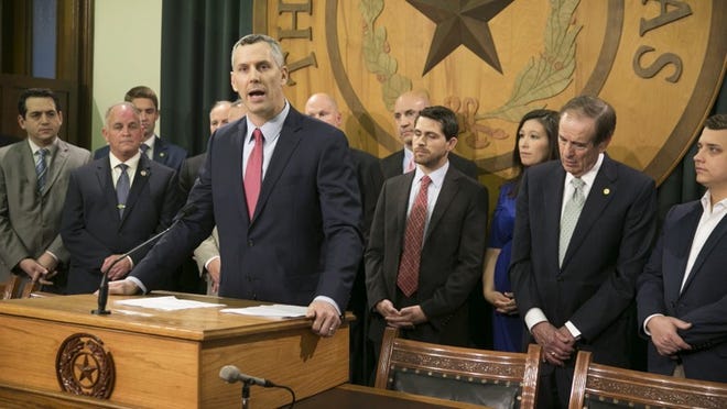 State Rep. Matt Schaefer, R-Tyler, surrounded by other abortion opponents Tuesday, said House leaders need to make abortion-related bills a priority. JAY JANNER / AMERICAN-STATESMAN