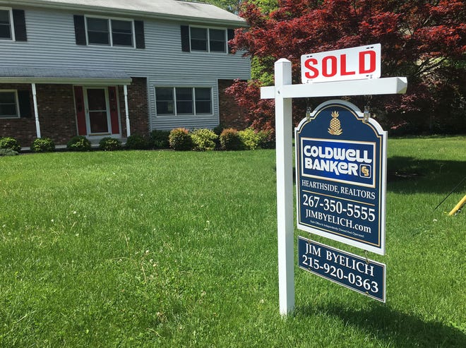 A home for sale in Lower Makefield features a sold sign. The housing market in Bucks and Montgomery counties this spring is showing signs of being a sellers' market.