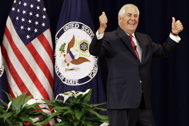 Secretary of State Rex Tillerson gives a double thumbs-up as he arrives to speak to State Department employees, Wednesday, May 3, 2017, at the State Department in Washington. THE ASSOCIATED PRESS