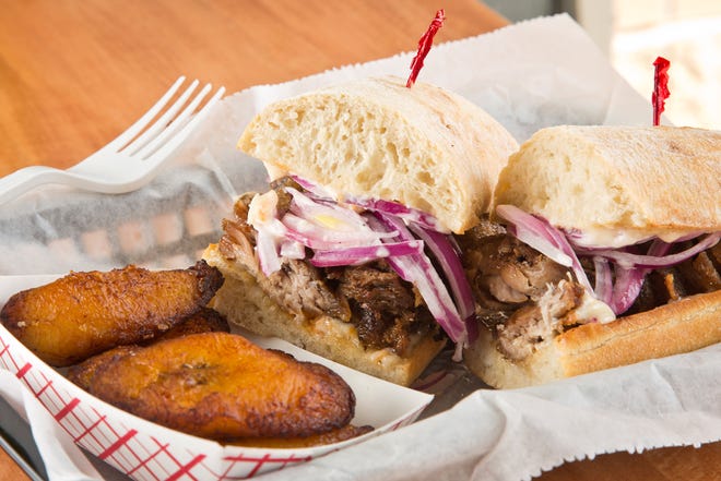 Chicharron Peruano Sandwich with a side of Plantains