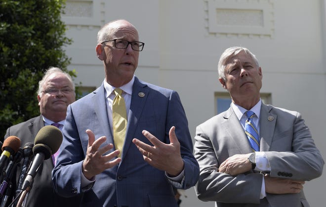 Rep. Greg Walden, R-Ore., center, flanked by Rep. Billy Long, R-Mo., left, and Rep. Fred Upton, R-Mich., speaks to reporters outside the White House in Washington Wednesday following a meeting with President Donald Trump on health care reform. [AP PHOTO]
