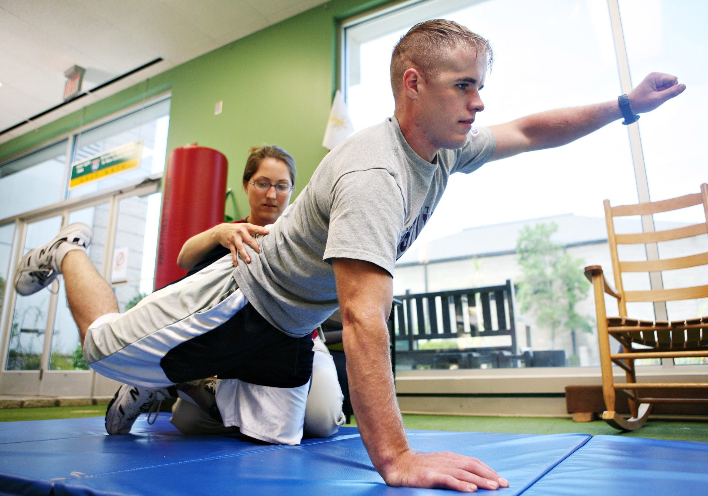 Sean DeBevoise works a physyical therapist at New Hanover Regional Medical Center in 2007. DeBevoise, a Marine, is trying to raise funds for a charter fishing company. STARNEWS FILE