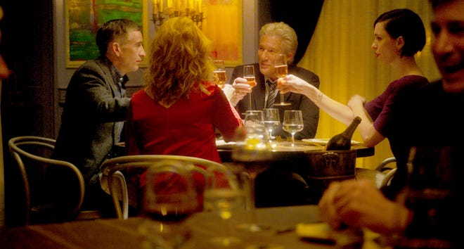 Clockwise from left, Steve Coogan, Richard Gere, Rebecca Hall and Laura Linney are shown in a scene from "The Dinner." [The Orchard]