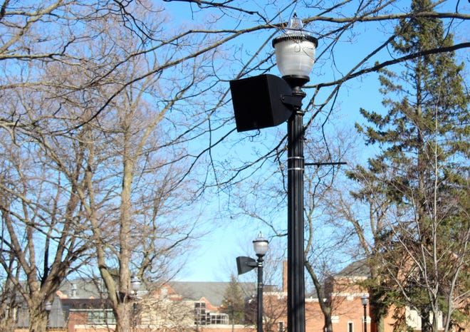 Speakers part of Tulip Time's new sound system can be seen on light poles at Centennial Park. Sydney Smith/Sentinel Photo