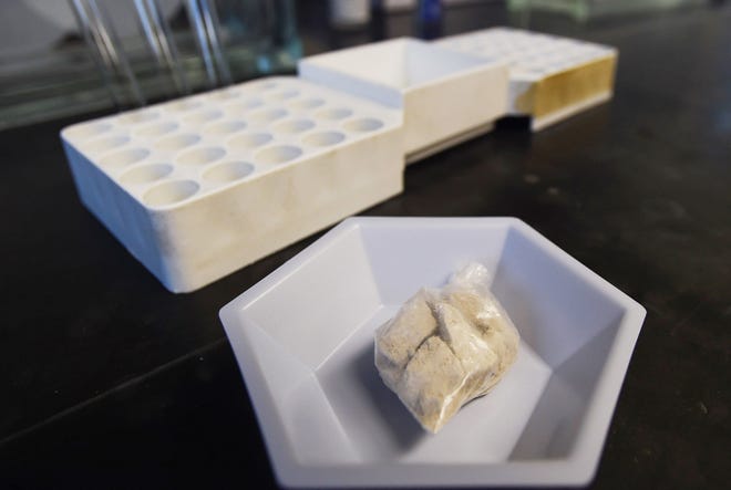 The drug "gray death" lies in a dish at the crime lab of the Georgia Bureau of Investigations in Decatur, Ga., on Thursday, May 4, 2017. The new and dangerous opioid combo underscores the ever-changing nature of the U.S. addictions epidemic. Investigators who nicknamed the mixture have detected it or recorded overdoses blamed on it in Alabama, Georgia and Ohio. THE ASSOCIATED PRESS