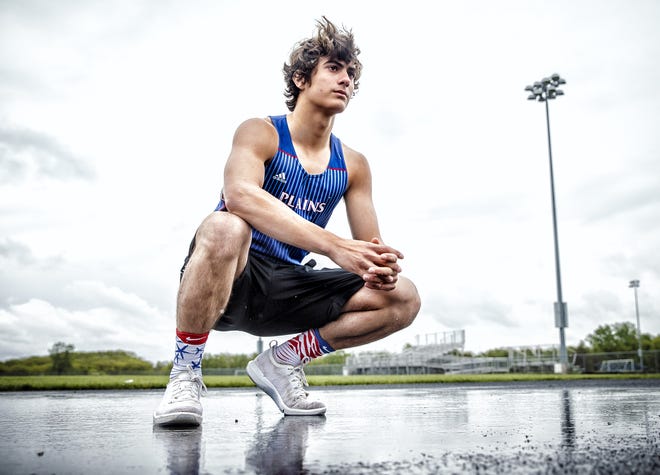 Pleasant Plains sophomore Sam McAfee suffered a double fracture in his lower right leg during a junior varsity football game in 2015 but has come back to compete in the long jump, sprint relays and 100-meter dash. [Justin L. Fowler/The State Journal-Register]