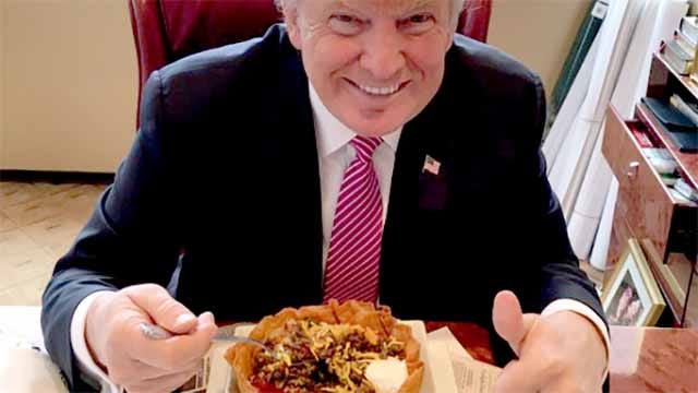 FILE PHOTO: Donald Trump and his taco bowl from Trump Tower on Cinco de Mayo, 2016.