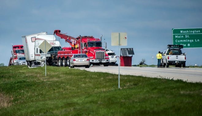 FRED ZWICKY/JOURNAL STAR

Wreckage is cleared from U.S. Route 24 near Washington following a two-vehicle accident Tuesday. A Eureka man was found dead in his sport-utility vehicle, which veered into the path of an oncoming truck.