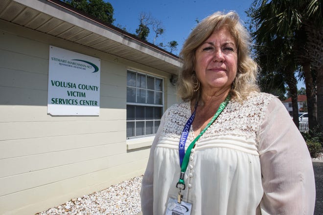 Zeva Edmondson, director of the Volusia Rape Crisis Center, stands in front of the New Smyrna Beach center that has been helping sexual assault victims in the Volusia County area since 2015. [News-Journal / LOLA GOMEZ]